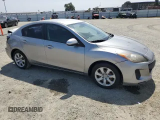 2012 Mazda 3 i Sport with VIN JM1BL1UF9C1504680, listed as a Copart auction lot 53308955 with 116,339 mi miles and Salvage Title. Bid and sale history available at DreamBid. Image 4.