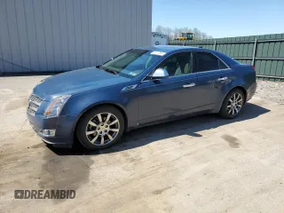 2009 Cadillac CTS AWD with VIN 1G6DH577390123365, listed as a Copart auction lot 54815885 with 141,026 mi miles and Salvage Title. Bid and sale history available at DreamBid. Image 1.