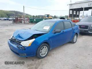 2010 Ford Focus SE with VIN 1FAHP3FNXAW265788, listed as a IAAI auction lot 42053567 with 161,345 mi miles. Bid and sale history available at carsss.com. Image 2.