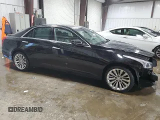 2015 Cadillac CTS Performance AWD with VIN 1G6AY5S3XF0131806, listed as a Copart auction lot 58422704 with 69,544 mi miles and Salvage Title. Bid and sale history available at DreamBid. Image 4.