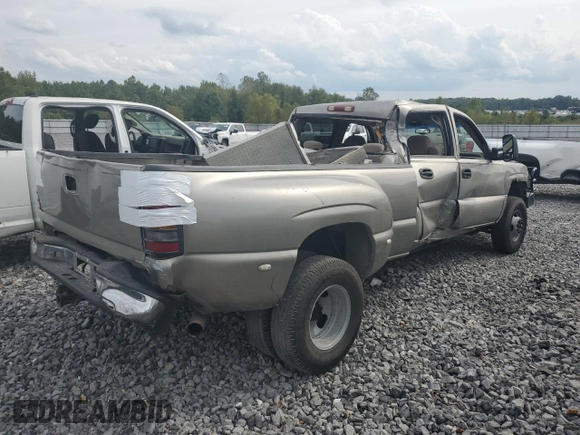 2001 Chevrolet Silverado 3500 LS z VIN 1GCJC33121F182199, wystawiony jako Copart lot #72530404 z przebiegiem 252 199 mil mil oraz Szkoda całkowita • Salvage title. Historia ofert i sprzedaży dostępna na DreamBid. Obrazek 3.