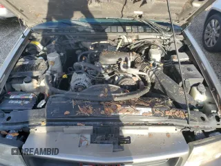 2000 GMC Sonoma SLS z VIN 1GTCS19W3Y8158978, wystawiony jako Copart lot #74180564 z przebiegiem Nie podano mil oraz Szkody całkowita. Historia ofert i sprzedaży dostępna na DreamBid. Obrazek 11.