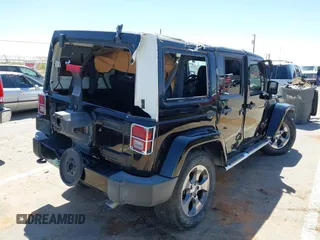 2016 Jeep Wrangler Unlimited 75th Anniversary with VIN 1C4BJWEGXGL270750, listed as a IAAI auction lot 42098170 with 87,316 mi miles and . Bid and sale history available at DreamBid. Image 4.