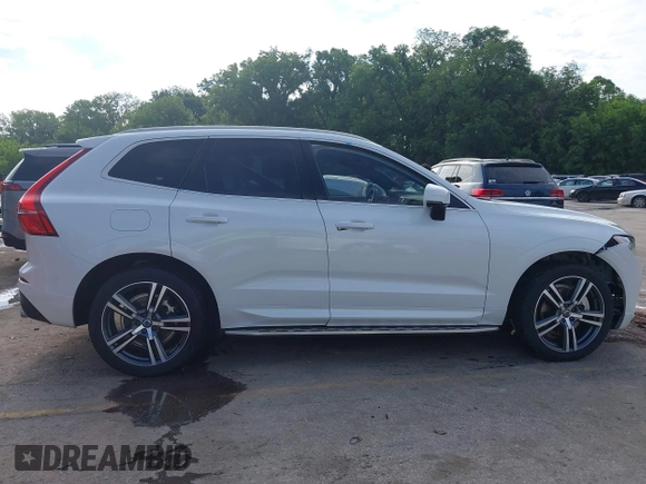 2021 Volvo XC60 Momentum with VIN YV4A22RK8M1696361, listed as a IAAI auction lot 42345602 with 68,574 mi miles and . Bid and sale history available at DreamBid. Image 14.