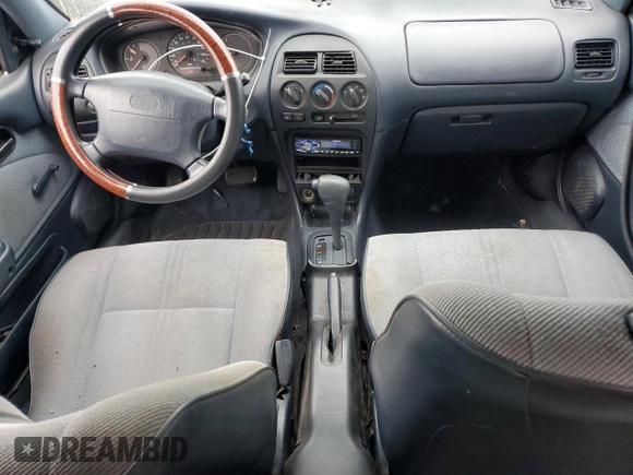 1994 Geo Prizm z VIN 1Y1SK5364RZ023169, wystawiony jako Copart lot #78828524 z przebiegiem 93 093 mil mil oraz Szkoda całkowita • Salvage title. Historia ofert i sprzedaży dostępna na DreamBid. Obrazek 8.