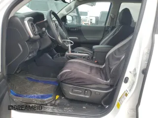 2023 Toyota Tacoma SR5 z VIN 3TMAZ5CN2PM209813, wystawiony jako Copart lot #53946645 z przebiegiem 23 411 mil mil oraz Szkody całkowita. Historia ofert i sprzedaży dostępna na DreamBid. Obrazek 7.