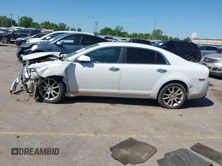 2011 Chevrolet Malibu LTZ with VIN 1G1ZE5EU3BF368263, listed as a IAAI auction lot 41937180 with 300,164 mi miles and . Bid and sale history available at DreamBid. Image 14.