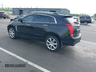 2015 Cadillac SRX Performance Collection with VIN 3GYFNCE3XFS638994, listed as a IAAI auction lot 42243558 with 141,704 mi miles and . Bid and sale history available at DreamBid. Image 3.