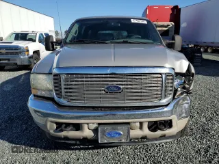 2002 Ford Excursion XLT z VIN 1FMNU41S72EB48066, wystawiony jako Copart lot #87483144 z przebiegiem 192 298 mil mil oraz Szkoda całkowita • Salvage title. Historia ofert i sprzedaży dostępna na DreamBid. Obrazek 5.