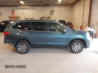 2021 Honda Pilot EX-L z VIN 5FNYF6H54MB082455, wystawiony jako IAAI lot #42343787 z przebiegiem 25 954 mil mil oraz . Historia ofert i sprzedaży dostępna na DreamBid. Obrazek 13.