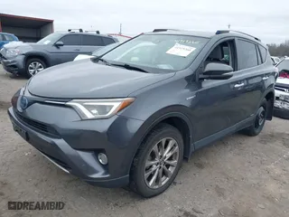 2016 Toyota RAV4 Hybrid Limited with VIN JTMDJREV0GD058281, listed as a IAAI auction lot 41519260 with 54,955 mi miles. Bid and sale history available at carsss.com. Image 17.