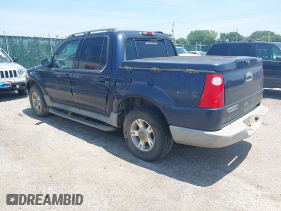 2003 Ford Explorer Sport Trac XLS z VIN 1FMZU77E53UB66531, wystawiony jako IAAI lot #42509028 z przebiegiem 199 323 mil mil oraz . Historia ofert i sprzedaży dostępna na DreamBid. Obrazek 3.