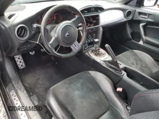 2014 Subaru BRZ Limited z VIN JF1ZCAC10E9600552, wystawiony jako Copart lot #64203845 z przebiegiem 151 042 mil mil oraz Czysty tytuł • Clean title. Historia ofert i sprzedaży dostępna na DreamBid. Obrazek 8.