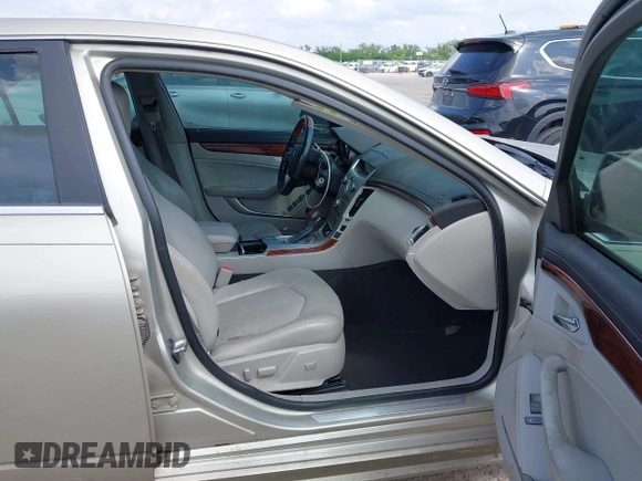 2013 Cadillac CTS Luxury with VIN 1G6DE5E55D0120843, listed as a IAAI auction lot 42145982 with 147,127 mi miles and . Bid and sale history available at DreamBid. Image 5.