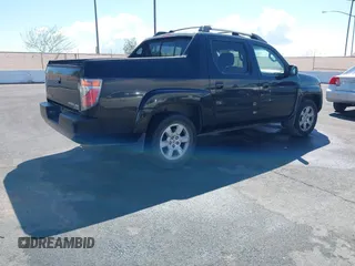 2007 Honda Ridgeline RTL w/Leather with VIN 2HJYK16577H547869, listed as a IAAI auction lot 41939741 with 248,916 mi miles. Bid and sale history available at carsss.com. Image 4.
