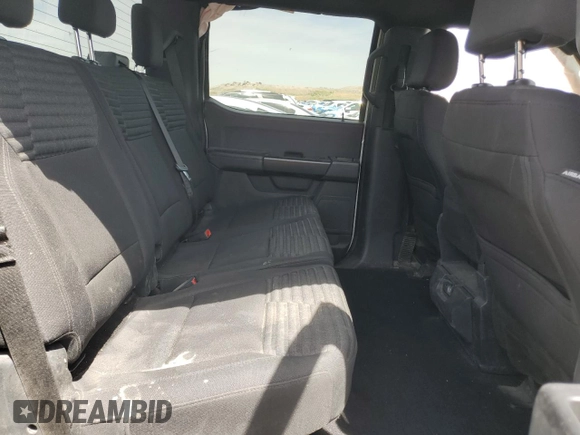 2023 Ford F-150 XL with VIN 1FTEW1EPXPFC20804, listed as a Copart auction lot 56555615 with 60,984 mi miles and Salvage title. Bid and sale history available at DreamBid. Image 10.