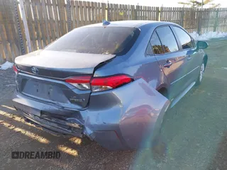 2023 Toyota Corolla Hybrid LE with VIN JTDBDMHE2P3004712, listed as a IAAI auction lot 41235157 with 79,581 mi miles. Bid and sale history available at carsss.com. Image 4.