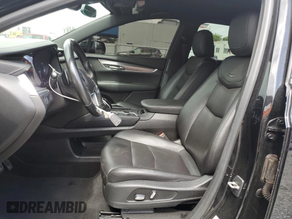 2021 Cadillac XT5 FWD Luxury with VIN 1GYKNAR46MZ127028, listed as a Copart auction lot 47555235 with 48,364 mi miles and Salvage Title. Bid and sale history available at carsss.com. Image 7.