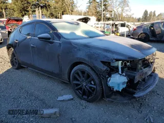 2022 Mazda Mazda3 Hatchback Premium with VIN JM1BPBML0N1519877, listed as a Copart auction lot 41886985 with 27,528 mi miles and Salvage Title. Bid and sale history available at carsss.com. Image 4.