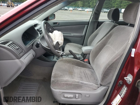 2004 Toyota Camry LE z VIN JTDBE32KX40273821, wystawiony jako Copart lot #58938275 z przebiegiem 153 096 mil mil oraz Szkoda całkowita • Salvage title. Historia ofert i sprzedaży dostępna na DreamBid. Obrazek 7.