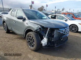 2023 Hyundai Santa Cruz SEL z VIN 5NTJC4AE5PH071917, wystawiony jako IAAI lot #41249984 z przebiegiem 14 703 mil mil oraz . Historia ofert i sprzedaży dostępna na DreamBid. Obrazek 1.