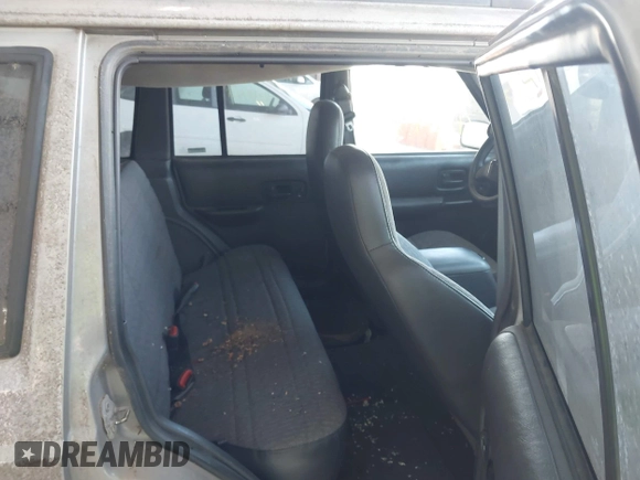 2000 Jeep Cherokee z VIN 1J4FF48S1YL273555, wystawiony jako IAAI lot #42249135 z przebiegiem 184 674 mil mil oraz . Historia ofert i sprzedaży dostępna na DreamBid. Obrazek 8.