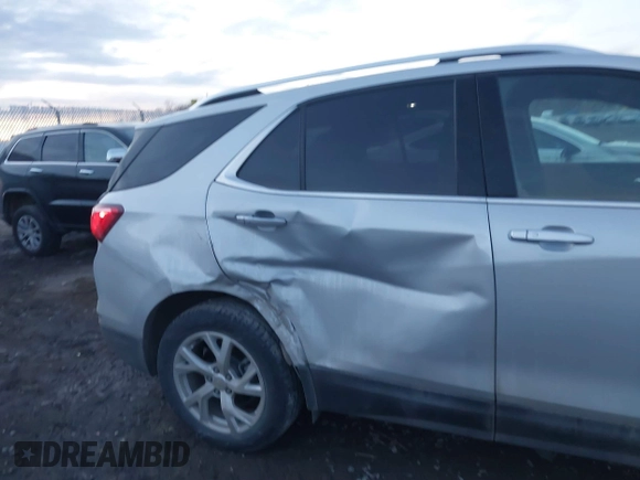 2019 Chevrolet Equinox Premier with VIN 2GNAXXEV1K6244691, listed as a IAAI auction lot 41164317 with 89,604 mi miles and . Bid and sale history available at DreamBid. Image 6.