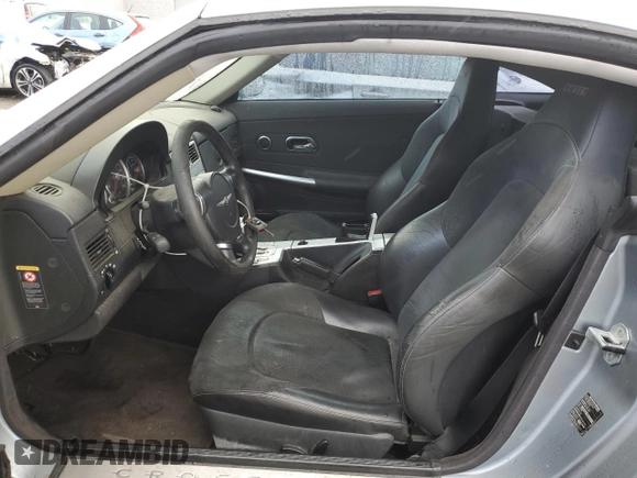 2005 Chrysler Crossfire z VIN 1C3AN79N35X039973, wystawiony jako Copart lot #44098695 z przebiegiem 109 161 mil mil oraz Czysty tytuł • Clean title. Historia ofert i sprzedaży dostępna na DreamBid. Obrazek 7.