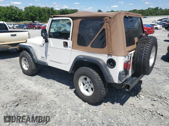 2004 Jeep Wrangler Sport with VIN 1J4FA49S94P751849, listed as a Copart auction lot 55519445 with 139,854 mi miles and Salvage title. Bid and sale history available at DreamBid. Image 2.