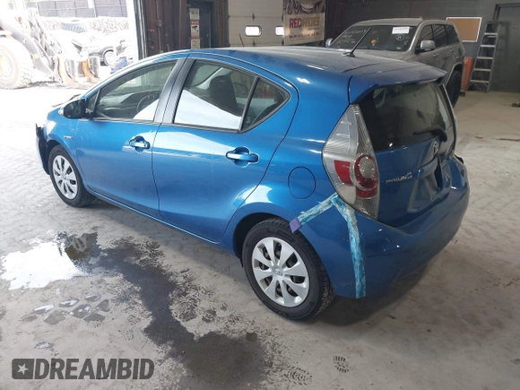2012 Toyota Prius One with VIN JTDKDTB32C1023106, listed as a IAAI auction lot 42185223 with 210,691 mi miles. Bid and sale history available at carsss.com. Image 3.