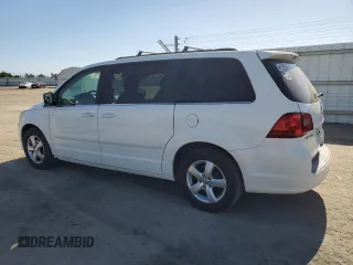 2011 Volkswagen Routan SE with VIN 2V4RW3DG5BR739944, listed as a Copart auction lot 56787495 with 84,932 mi miles and Salvage title. Bid and sale history available at DreamBid. Image 2.