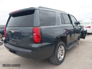 2019 Chevrolet Tahoe LT with VIN 1GNSCBKC8KR366460, listed as a IAAI auction lot 41384327 with 76,861 mi miles. Bid and sale history available at carsss.com. Image 4.