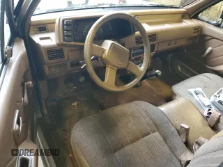 1992 Isuzu Pickup S z VIN 4S1CL11L0N4208813, wystawiony jako Copart lot #80966344 z przebiegiem 166 056 mil mil oraz Szkody całkowita. Historia ofert i sprzedaży dostępna na DreamBid. Obrazek 8.