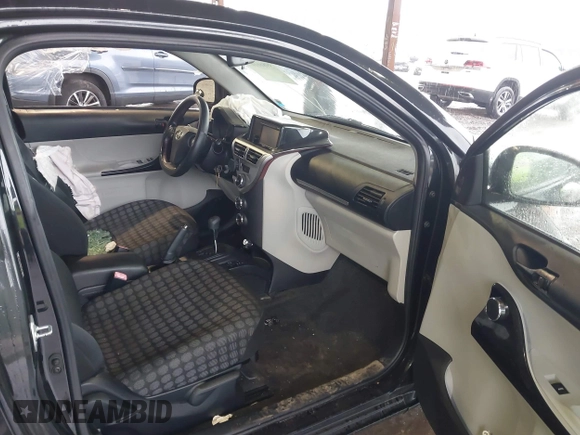 2013 Scion iQ with VIN JTNJJXB08DJ024825, listed as a IAAI auction lot 41842818 with 91,136 mi miles and . Bid and sale history available at DreamBid. Image 5.