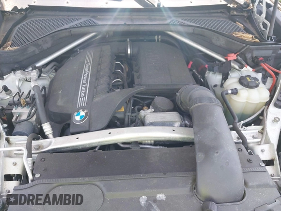 2016 BMW X6 xDrive35i z VIN 5UXKU2C5XG0N83220, wystawiony jako IAAI lot #39197569 z przebiegiem Nie podano mil oraz . Historia ofert i sprzedaży dostępna na DreamBid. Obrazek 10.
