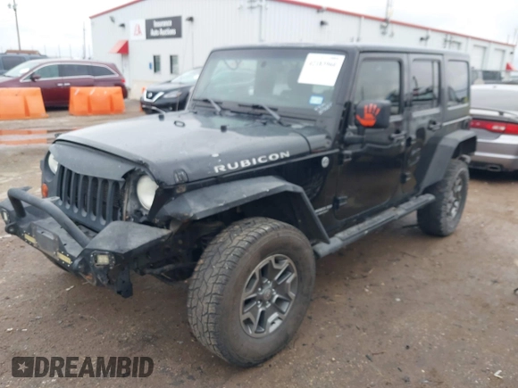 2012 Jeep Wrangler Unlimited Rubicon with VIN 1C4HJWFGXCL142804, listed as a IAAI auction lot 42183960 with 124,392 mi miles and . Bid and sale history available at DreamBid. Image 17.