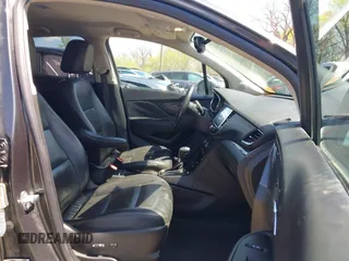 2017 Buick Encore Essence with VIN KL4CJCSB4HB012026, listed as a IAAI auction lot 41974604 with 139,467 mi miles and . Bid and sale history available at carsss.com. Image 5.