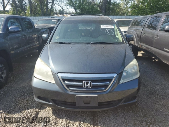 2005 Honda Odyssey EX with VIN 5FNRL38415B009502, listed as a Copart auction lot 53872455 with 205,051 mi miles and Salvage title. Bid and sale history available at DreamBid. Image 5.