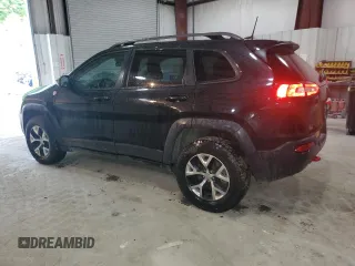 2016 Jeep Cherokee Trailhawk with VIN 1C4PJMBS7GW337774, listed as a Copart auction lot 55184885 with 161,567 mi miles and Salvage title. Bid and sale history available at DreamBid. Image 2.