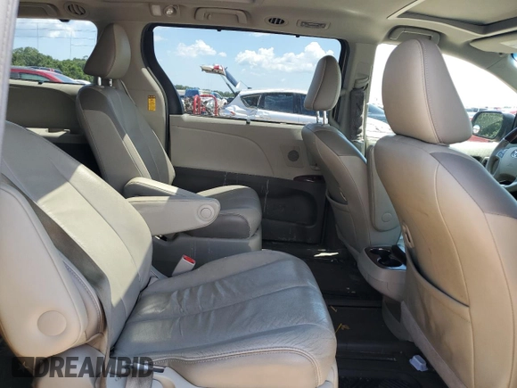 2014 Toyota Sienna XLE with VIN 5TDYK3DC8ES414814, listed as a Copart auction lot 64577875 with 111,675 mi miles and Salvage title. Bid and sale history available at DreamBid. Image 11.