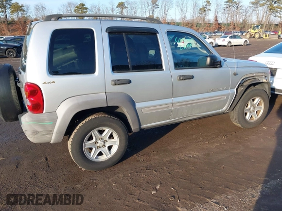 2002 Jeep Liberty Sport with VIN 1J4GL48K32W131467, listed as a IAAI auction lot 41485096 with 139,407 mi miles. Bid and sale history available at carsss.com. Image 4.