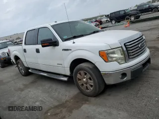 2012 Ford F-150 XL with VIN 1FTFW1CT0CFA02143, listed as a Copart auction lot 44970104 with 151,473 mi miles and Clean Title. Bid and sale history available at carsss.com. Image 4.