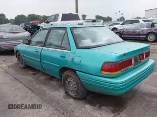 1994 Ford Escort z VIN 3FARP13J0RR121191, wystawiony jako IAAI lot #42202443 z przebiegiem 111 111 mil mil oraz . Historia ofert i sprzedaży dostępna na DreamBid. Obrazek 3.