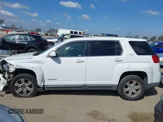 2014 GMC Terrain SLE with VIN 2GKALMEK7E6158772, listed as a IAAI auction lot 41956896 with 142,803 mi miles. Bid and sale history available at carsss.com. Image 14.