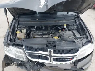 2017 Dodge Journey SE with VIN 3C4PDCABXHT694909, listed as a IAAI auction lot 41640828 with 188,657 mi miles and . Bid and sale history available at DreamBid. Image 10.