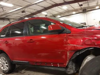 2010 Ford Edge SEL with VIN 2FMDK3JC5ABA38115, listed as a IAAI auction lot 41902143 with 166,678 mi miles. Bid and sale history available at carsss.com. Image 14.
