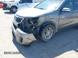 2015 Kia Sorento LX with VIN 5XYKTCA69FG584972, listed as a IAAI auction lot 42315973 with 165,907 mi miles and . Bid and sale history available at DreamBid. Image 6.