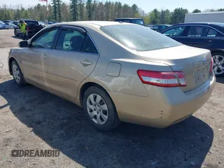 2011 Toyota Camry LE with VIN 4T1BF3EKXBU764478, listed as a IAAI auction lot 42180243 with 122,748 mi miles and . Bid and sale history available at carsss.com. Image 3.