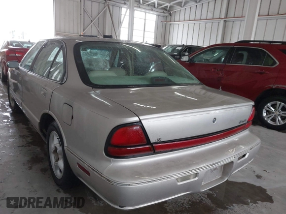 1996 Oldsmobile LSS z VIN 1G3HY5217T4809863, wystawiony jako IAAI lot #41623766 z przebiegiem 186 701 mil mil oraz . Historia ofert i sprzedaży dostępna na DreamBid. Obrazek 3.