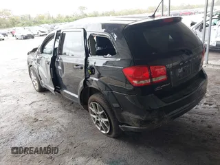 2015 Dodge Journey R/T with VIN 3C4PDDEG3FT555035, listed as a IAAI auction lot 41067936 with 214,244 mi miles and . Bid and sale history available at DreamBid. Image 3.